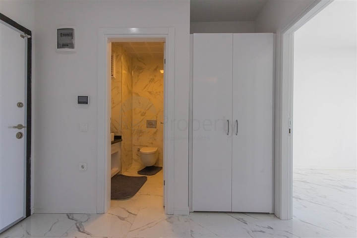 Большая квартира 1+1 в районе Махмутлар 