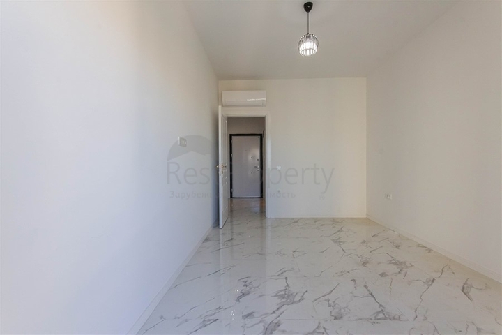 Большая квартира 1+1 в районе Махмутлар 