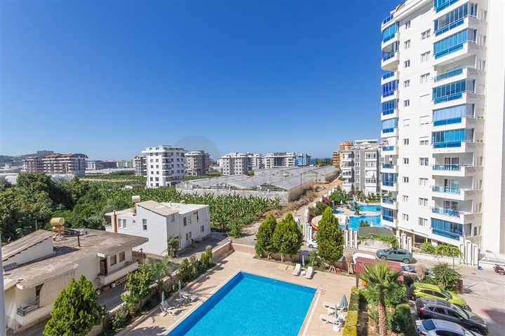 Большая квартира 1+1 в районе Махмутлар 