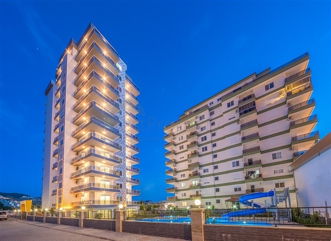 Большая квартира 1+1 в районе Махмутлар 