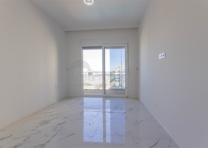 Большая квартира 1+1 в районе Махмутлар 