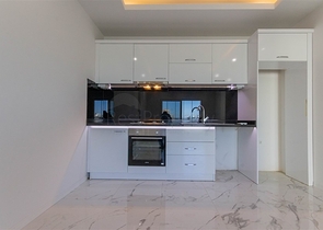 Большая квартира 1+1 в районе Махмутлар 