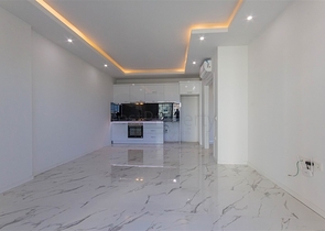 Большая квартира 1+1 в районе Махмутлар 