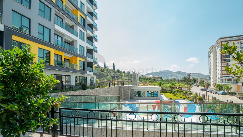 Двухкомнатная меблированная квартира в Махмутларе