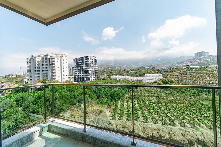 Двухкомнатная меблированная квартира в Махмутларе