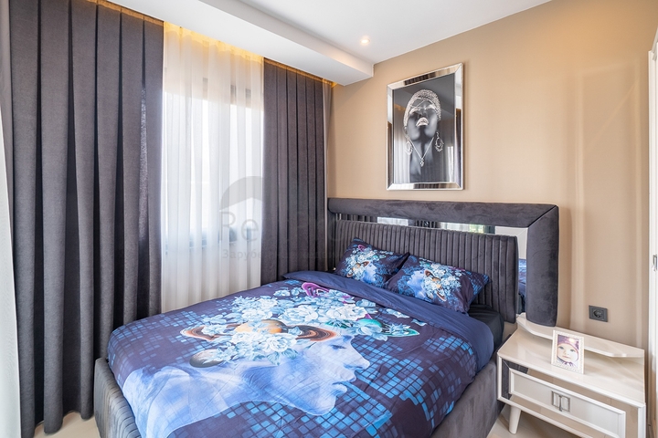 Двухкомнатная меблированная квартира в Махмутларе