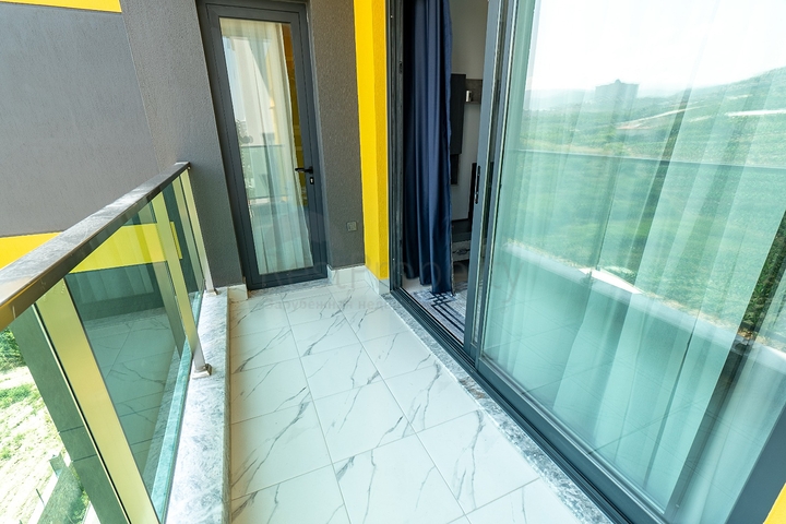 Двухкомнатная меблированная квартира в Махмутларе