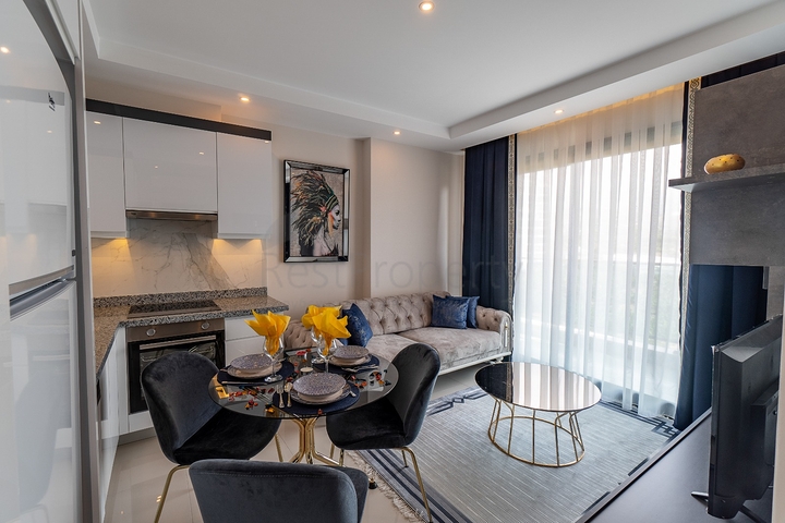 Двухкомнатная меблированная квартира в Махмутларе