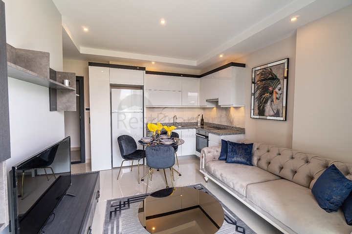 Двухкомнатная меблированная квартира в Махмутларе