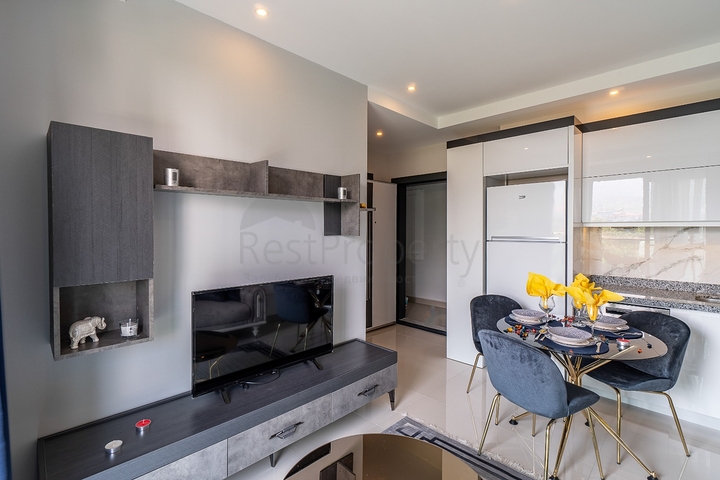 Двухкомнатная меблированная квартира в Махмутларе