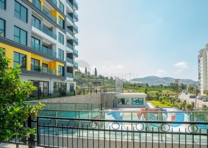 Двухкомнатная меблированная квартира в Махмутларе