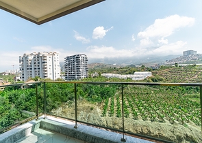 Двухкомнатная меблированная квартира в Махмутларе