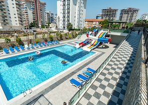 Двухкомнатная меблированная квартира в Махмутларе