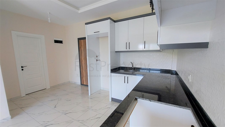 Квартира 1+1 в районе Махмутлар