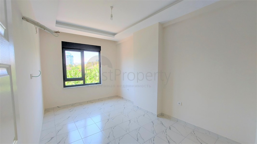 Квартира 1+1 в районе Махмутлар