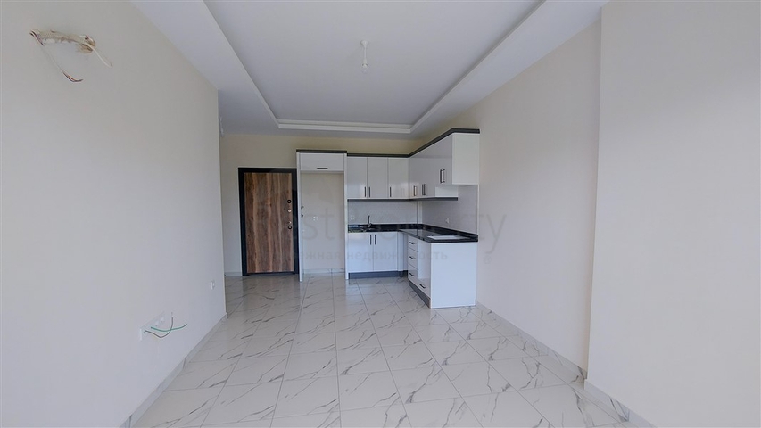 Квартира 1+1 в районе Махмутлар