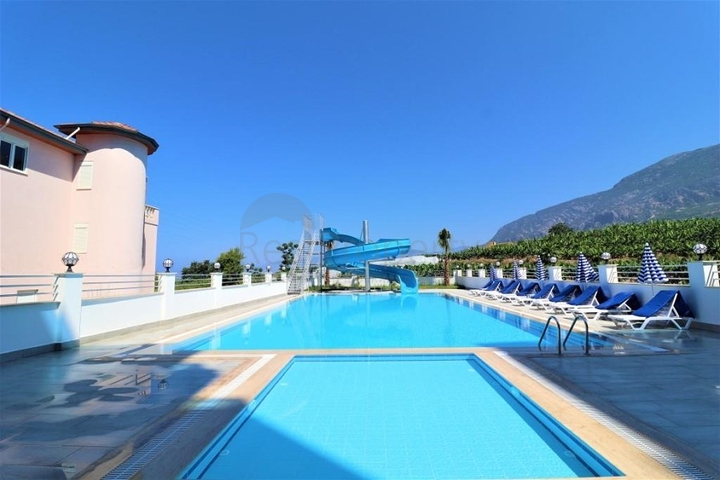 Меблированная двухкомнатная квартира в районе Махмутлар