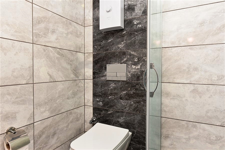 Меблированная двухкомнатная квартира в районе Махмутлар