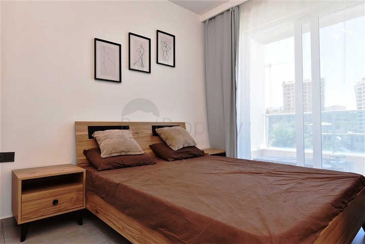 Меблированная двухкомнатная квартира в районе Махмутлар