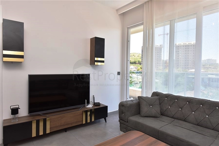 Меблированная двухкомнатная квартира в районе Махмутлар