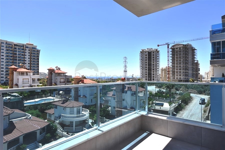 Меблированная двухкомнатная квартира в районе Махмутлар