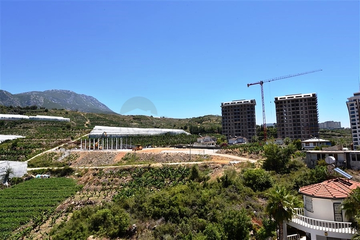 Меблированная двухкомнатная квартира в районе Махмутлар