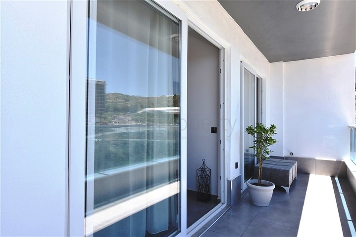 Меблированная двухкомнатная квартира в районе Махмутлар