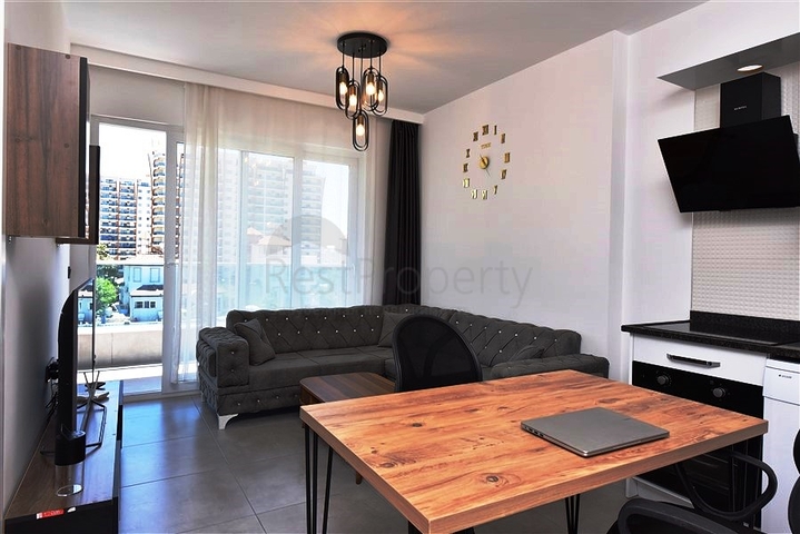 Меблированная двухкомнатная квартира в районе Махмутлар