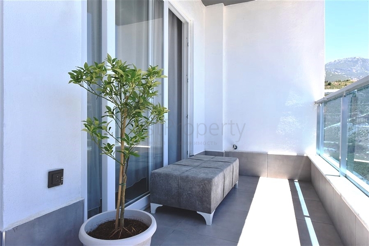 Меблированная двухкомнатная квартира в районе Махмутлар