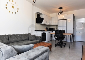 Меблированная двухкомнатная квартира в районе Махмутлар