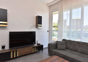 Меблированная двухкомнатная квартира в районе Махмутлар