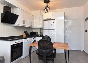 Меблированная двухкомнатная квартира в районе Махмутлар