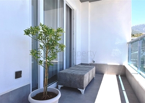 Меблированная двухкомнатная квартира в районе Махмутлар