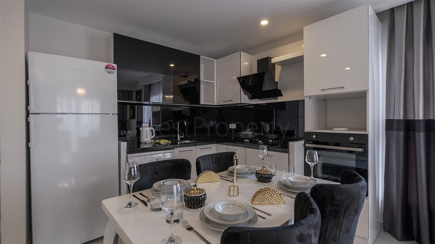 Двухкомнатная квартира в районе Махмутлар