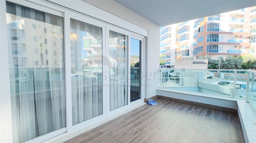 Двухкомнатная квартира в районе Махмутлар