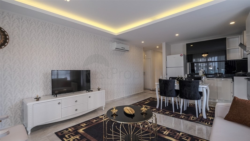 Двухкомнатная квартира в районе Махмутлар