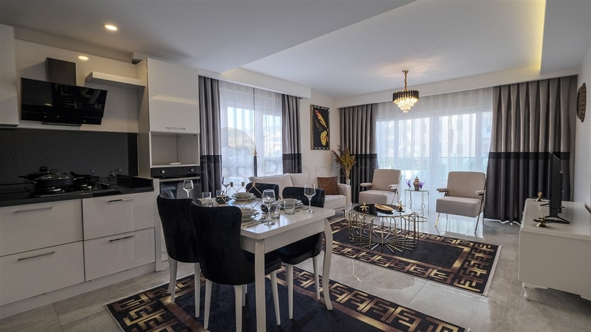 Двухкомнатная квартира в районе Махмутлар