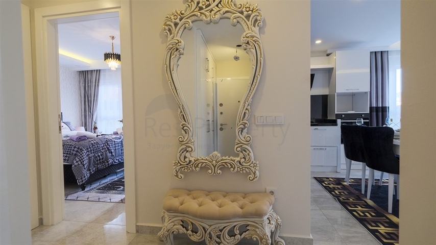 Двухкомнатная квартира в районе Махмутлар