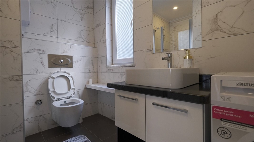 Двухкомнатная квартира в районе Махмутлар