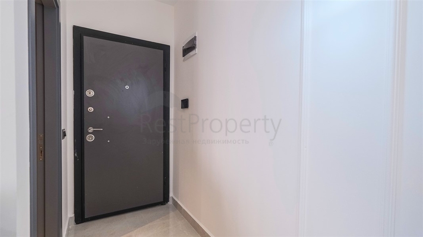 Двухкомнатная квартира в районе Махмутлар