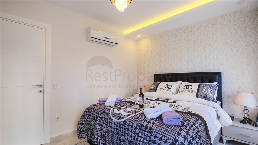 Двухкомнатная квартира в районе Махмутлар