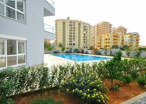 Двухкомнатная квартира в районе Махмутлар