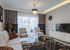 Двухкомнатная квартира в районе Махмутлар