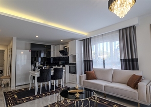 Двухкомнатная квартира в районе Махмутлар