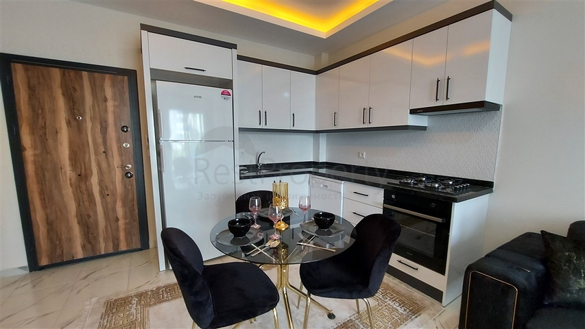 Квартира 1+1 в районе Махмутлар 