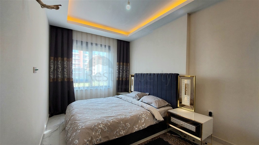 Квартира 1+1 в районе Махмутлар 