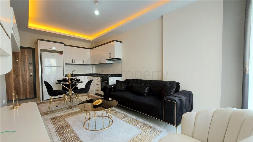 Квартира 1+1 в районе Махмутлар 