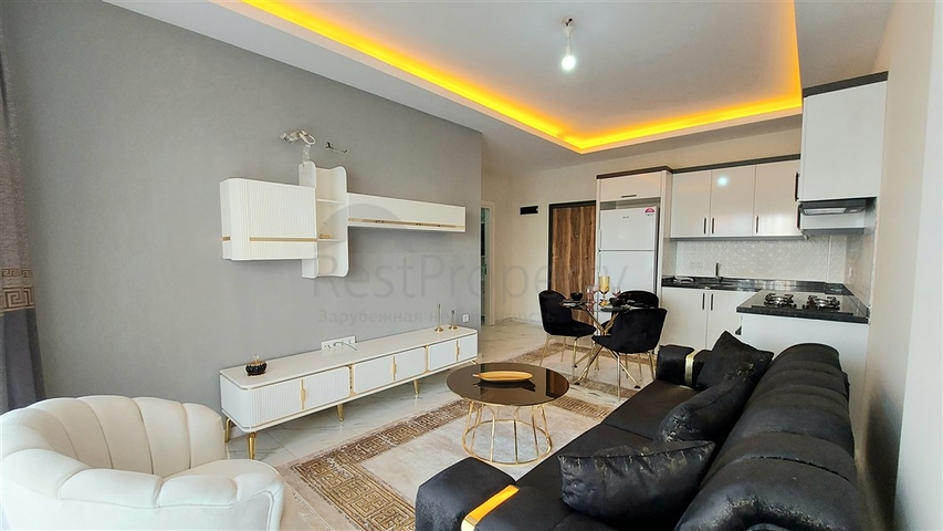 Квартира 1+1 в районе Махмутлар 