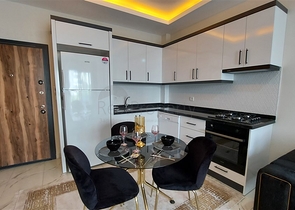 Квартира 1+1 в районе Махмутлар 