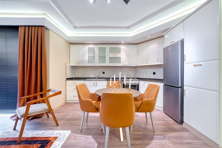 Квартира 2+1 с дизайнерским ремонтом в одном из самых зеленых комплексов Алании